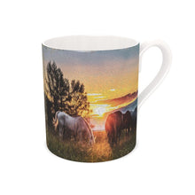 Load image into Gallery viewer, Horses Grazing with a Stunning Sunset Background Bone China Mug
